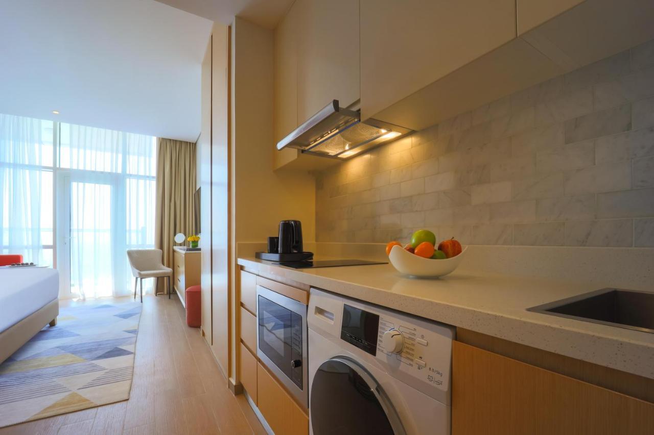 Adagio Jumeirah Village Triangle Dubaï Extérieur photo